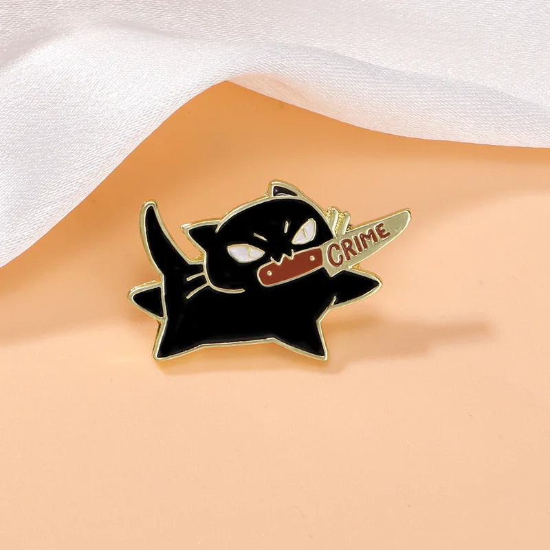 Black cat enamel pin representing cute and weird Halloween TikTok trends for 2026